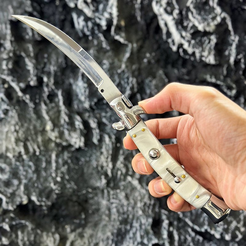 O1CN01m0ILYP1tCDqWwpAIT_2215853255865-0-cib-1.jpg 9 inch white shell resin curved blade switchblade stiletto switchblade